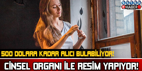 CİNSEL ORGANI İLE RESİM YAPIYOR!