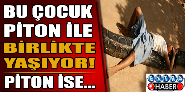 Bu çocuk bir piton ile birlikte yaşıyor!