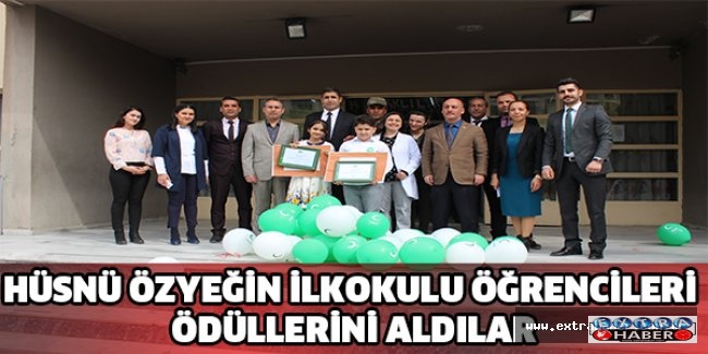 HÜSNÜ ÖZYEĞİN İLKOKULU ÖĞRENCİLERİ ÖDÜLLERİNİ ALDILAR