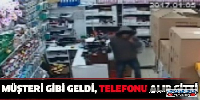 Müşteri gibi geldi, telefonu alıp gitti