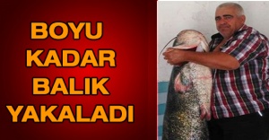 Boyu kadar balık yakaladı
