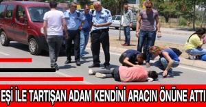 Eşi ile tartışan adam kendini aracın önüne attı