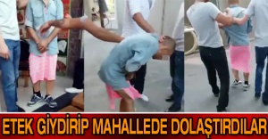Etek giydirip mahallede dolaştırdılar