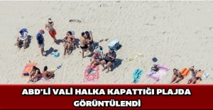 ABD’li vali halka kapattığı plajda görüntülendi