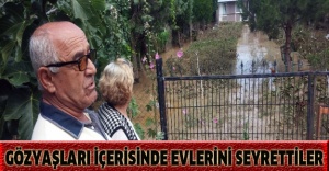Gözyaşları içerisinde evlerini seyrettiler