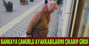 Bankaya çamurlu ayakkabılarını çıkarıp girdi