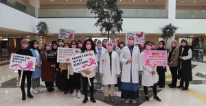 Meme kanserine karşı pembe maske taktılar